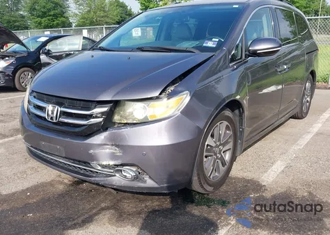 2015 Honda Odyssey Touring/Touring Elite z USA, uszkodzony, nr VIN 5FNRL5H93FB099048